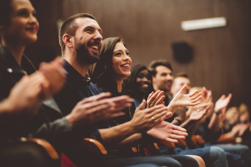 Happy Audience Applauding In The Theater Topp Arrangement 