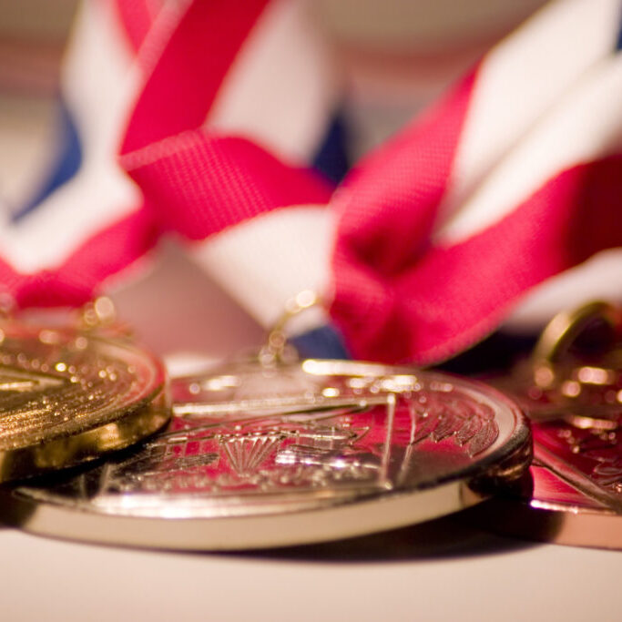 Gold, silver, and bronze medals.